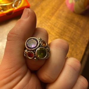 Silver size six ring with gemstones